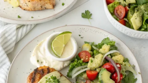 Fiesta lime chicken served on a plate with crispy golden crust and fresh lime slices